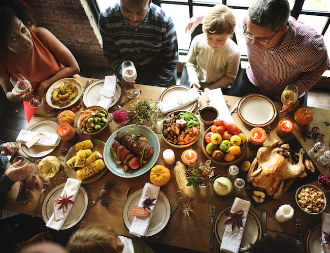 People Celebrating Thanksgiving Holiday Tradition Concept